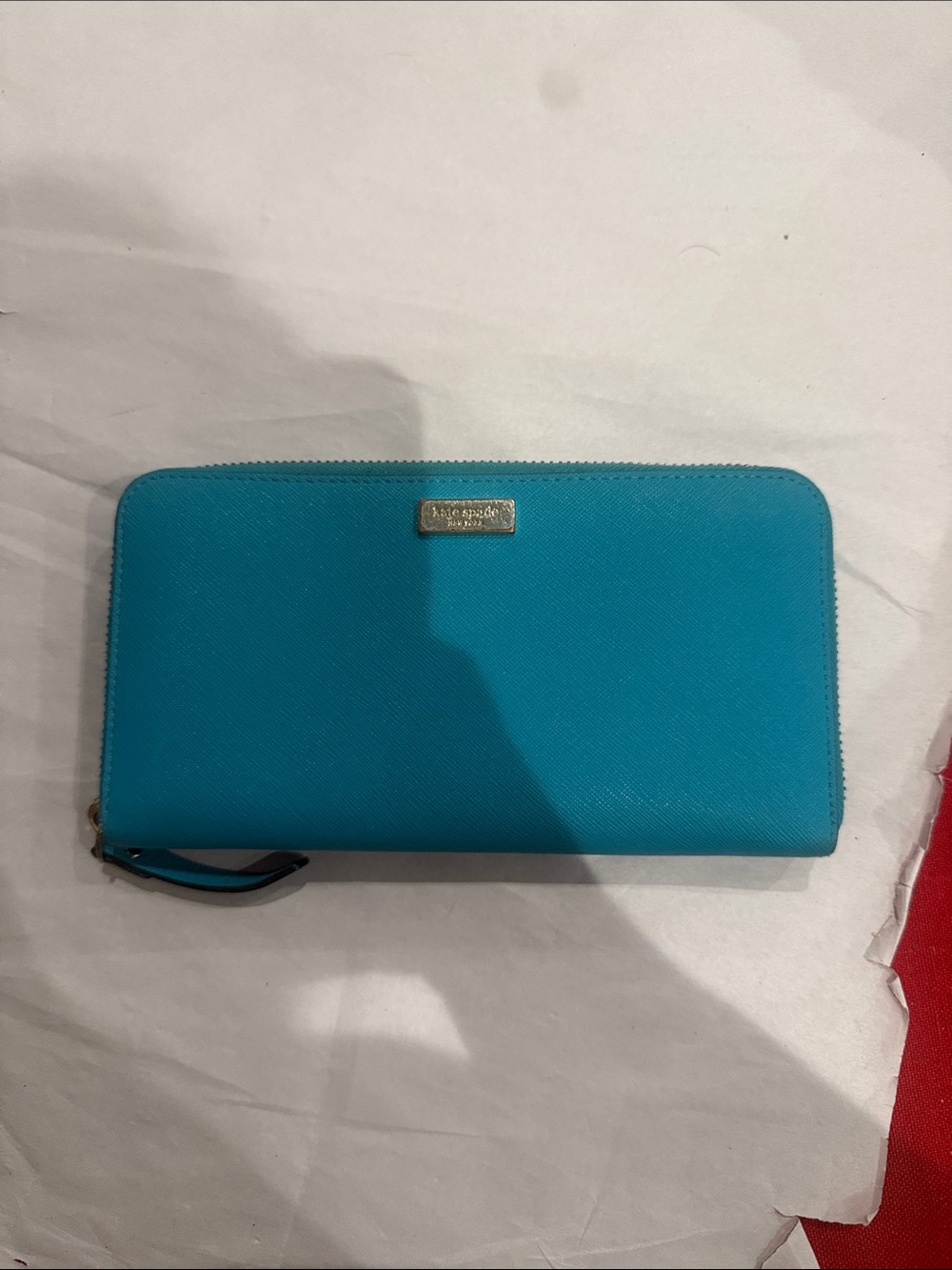 kate spade bright teal zip-around leather wallet